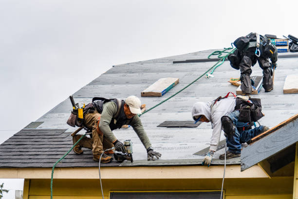 Professional Gutter Installation technician working in Coquille, OR